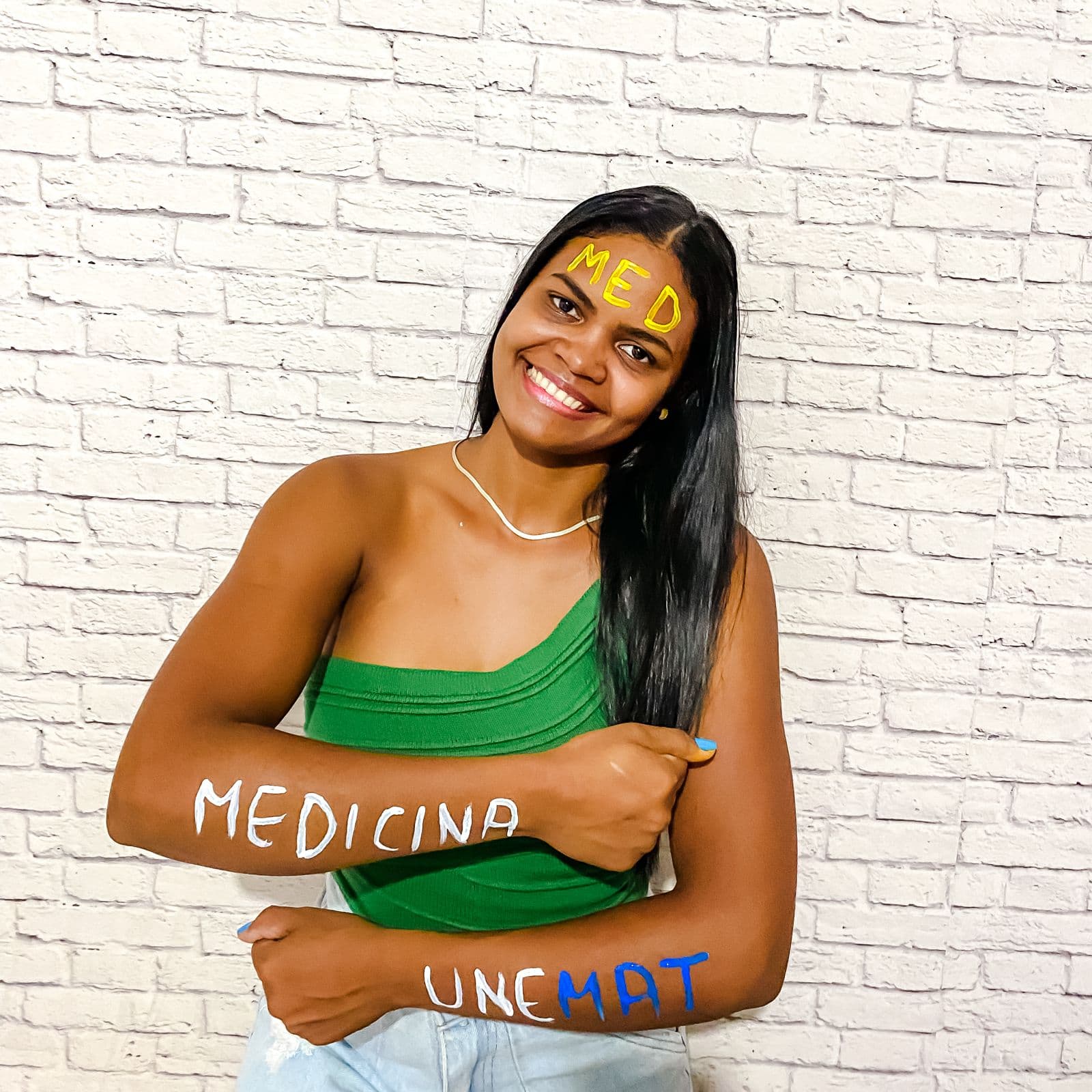 Aprovada do Hospital Questiona com pintura corporal 'MEDICINA UNEMAT'